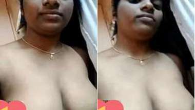 Sexy Indian wife opens big XXX hooters with dark nipples on amateur cam