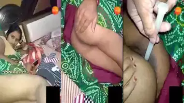 Desi Bhabhi anal poking with a candle